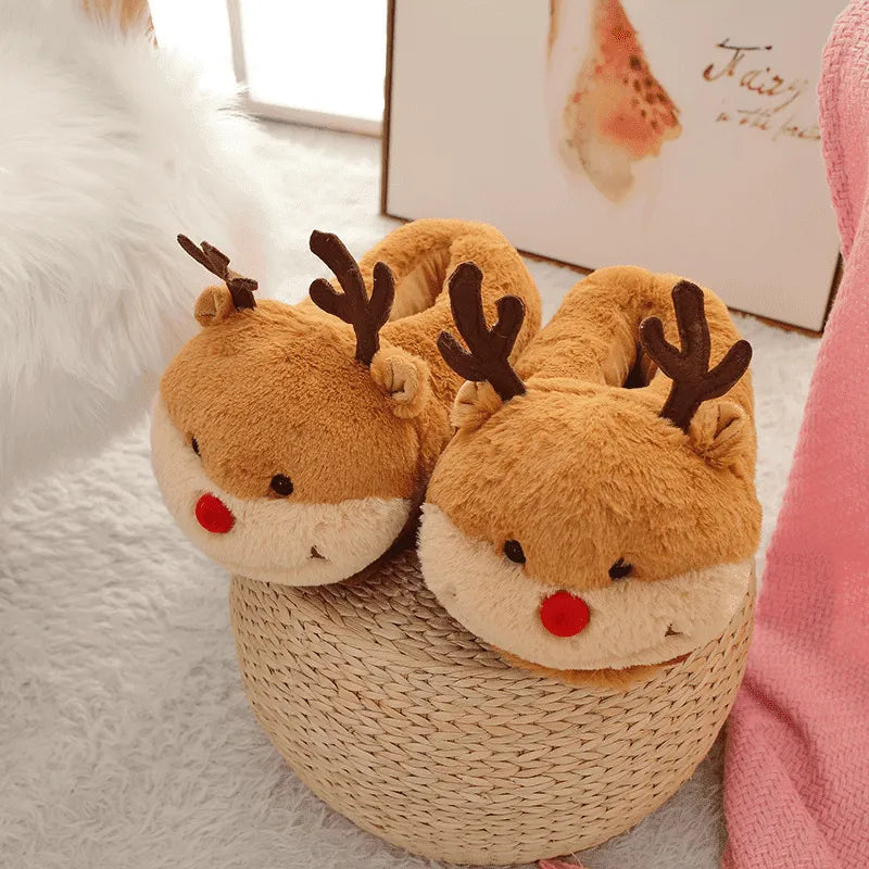 Image Chaussons Renne de Noël posés sur un panier